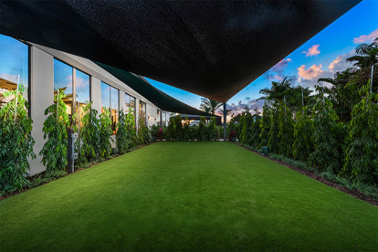 Peaceful, lush yoga garden in a GL Homes community in Boca Raton, offering residents a serene outdoor space for relaxation and wellness.